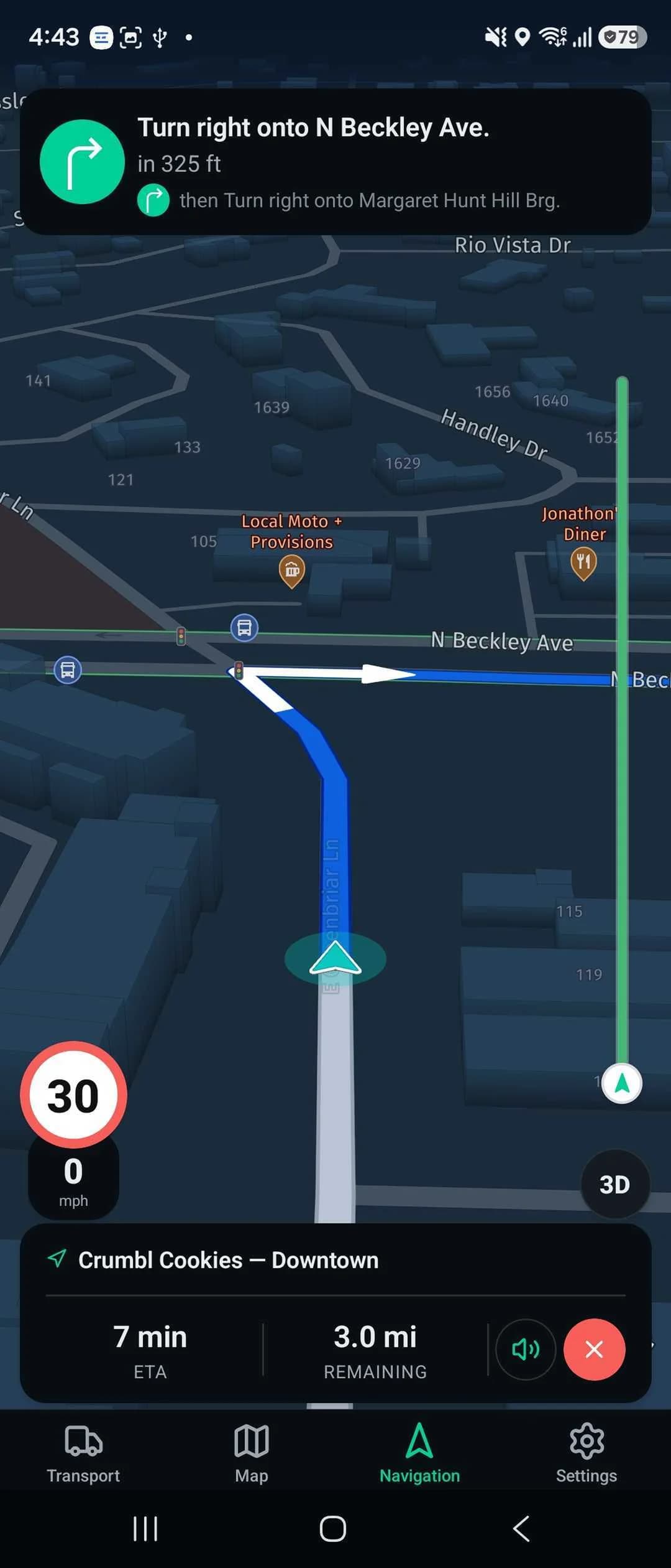 Fleetune Driver app turn-by-turn navigation showing the next turn, the speed limit, the stop being driven to, and the remaining time and distance